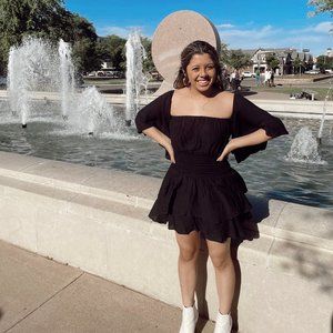 Off the shoulder, ruched, black dress